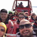 Selfie of group of friends on whale watching boat