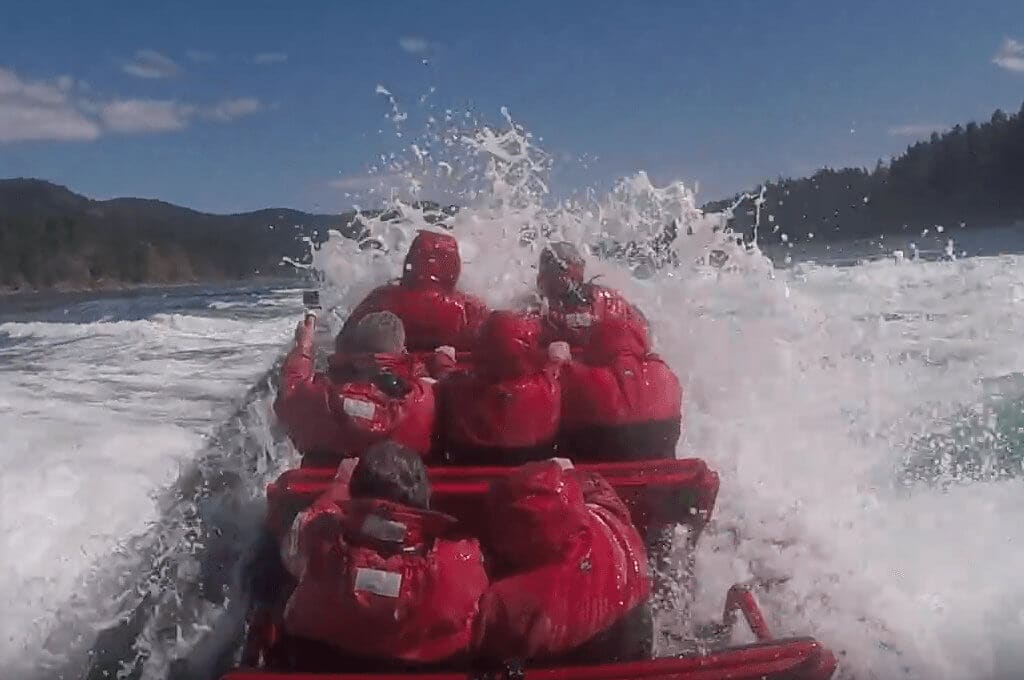 Zodiac crashing through Wave on Rapids Tour