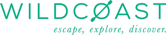 The Words Wildcoast with a paddle through the letter O, under it says "escape,explore,discover"