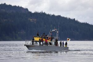 Covered Whale Watching Vessel with Guests onboard