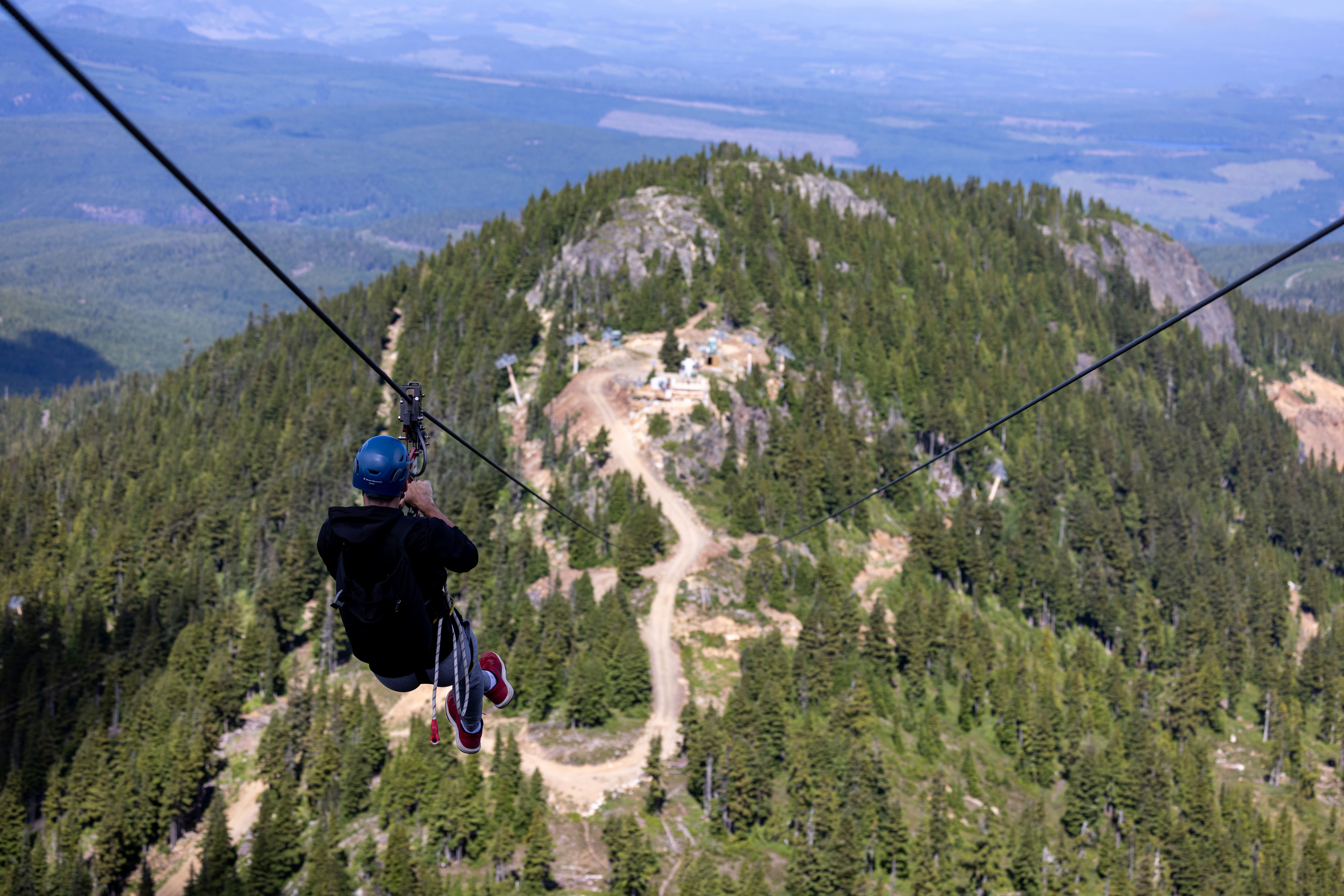 Guests ziplining at mt washington