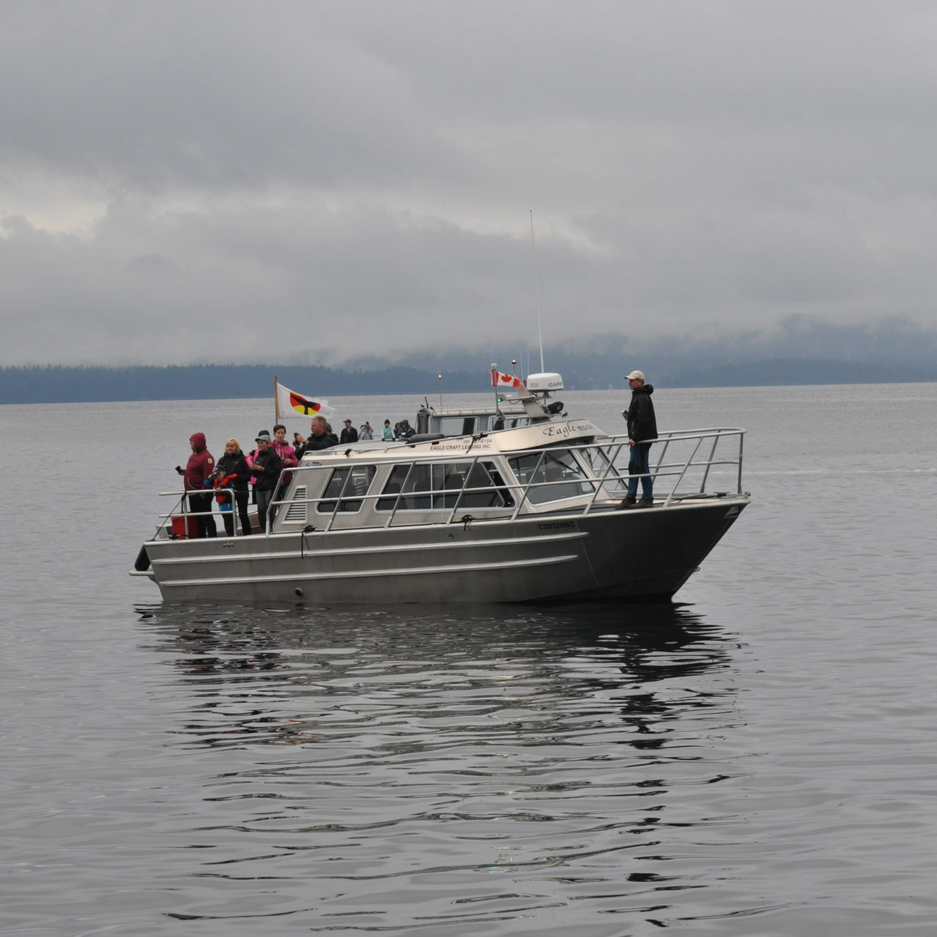 Covered Whale Watching boat with guests